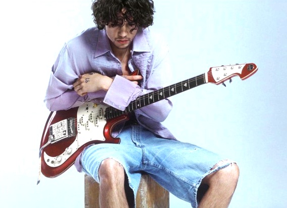 seen the american actor Dominic Fike with a guitar
